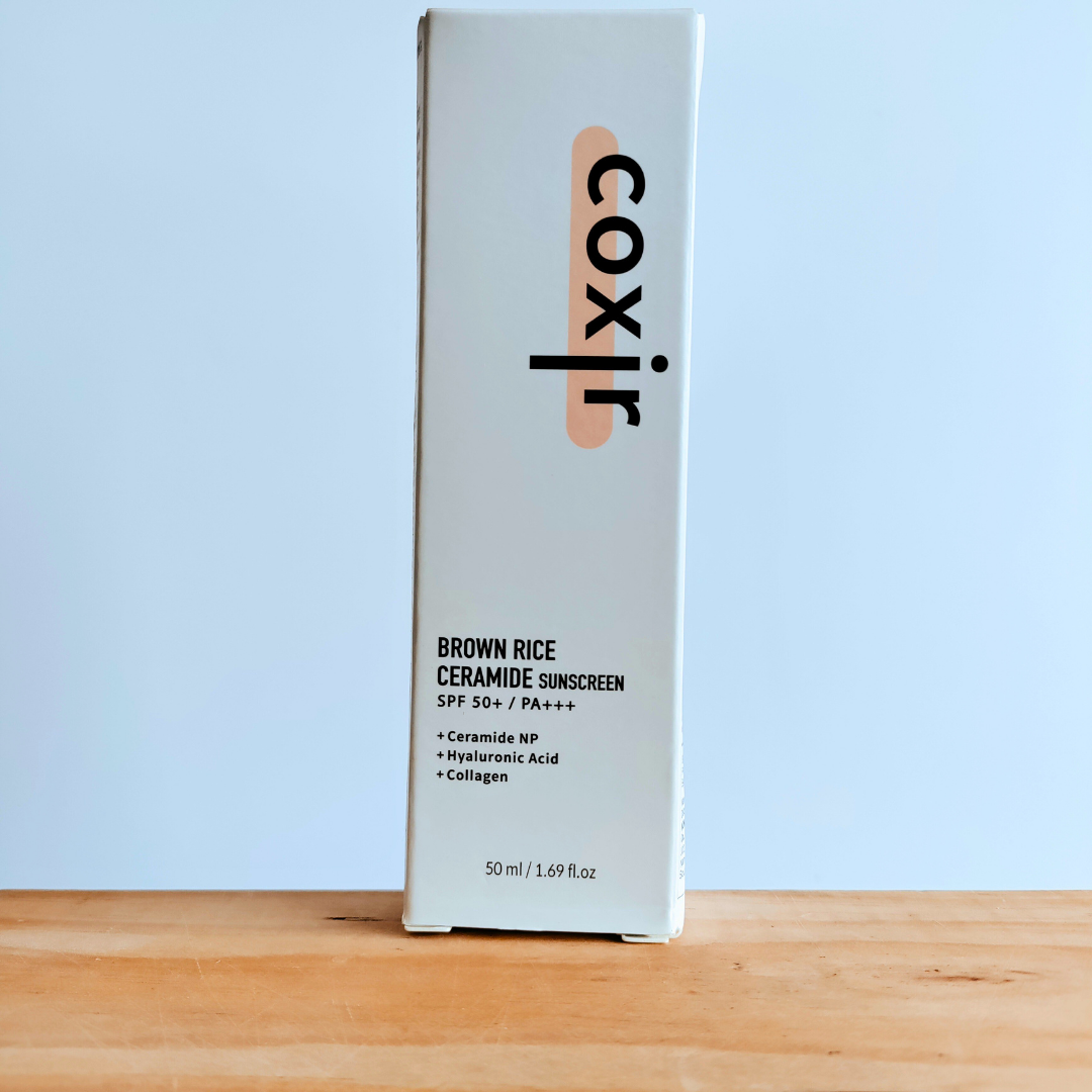 Coxir Brown Rice Ceramide Sunscreen SPF50+ PA+++ 50ml packaging box.