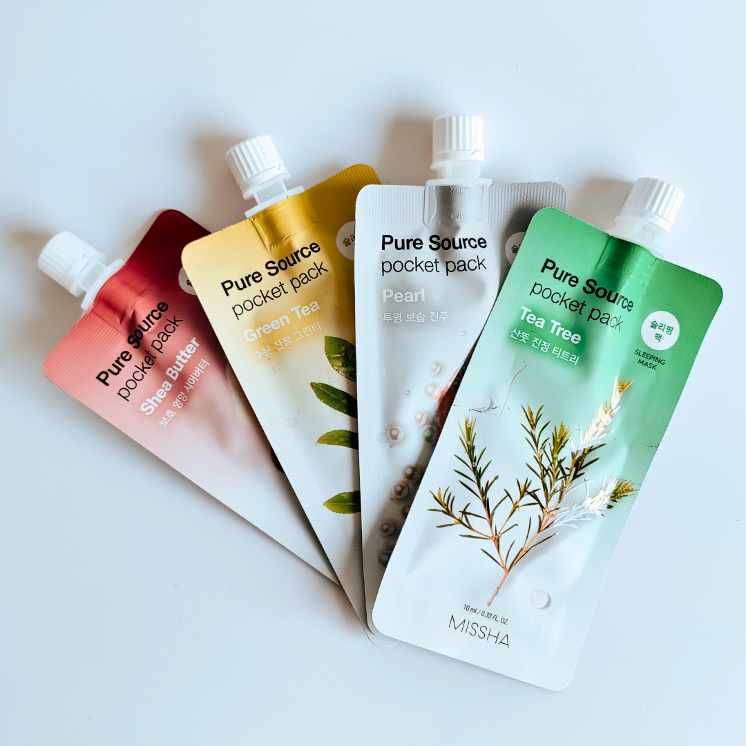 Four Pure Source pocket packs from Missha on a light gray background