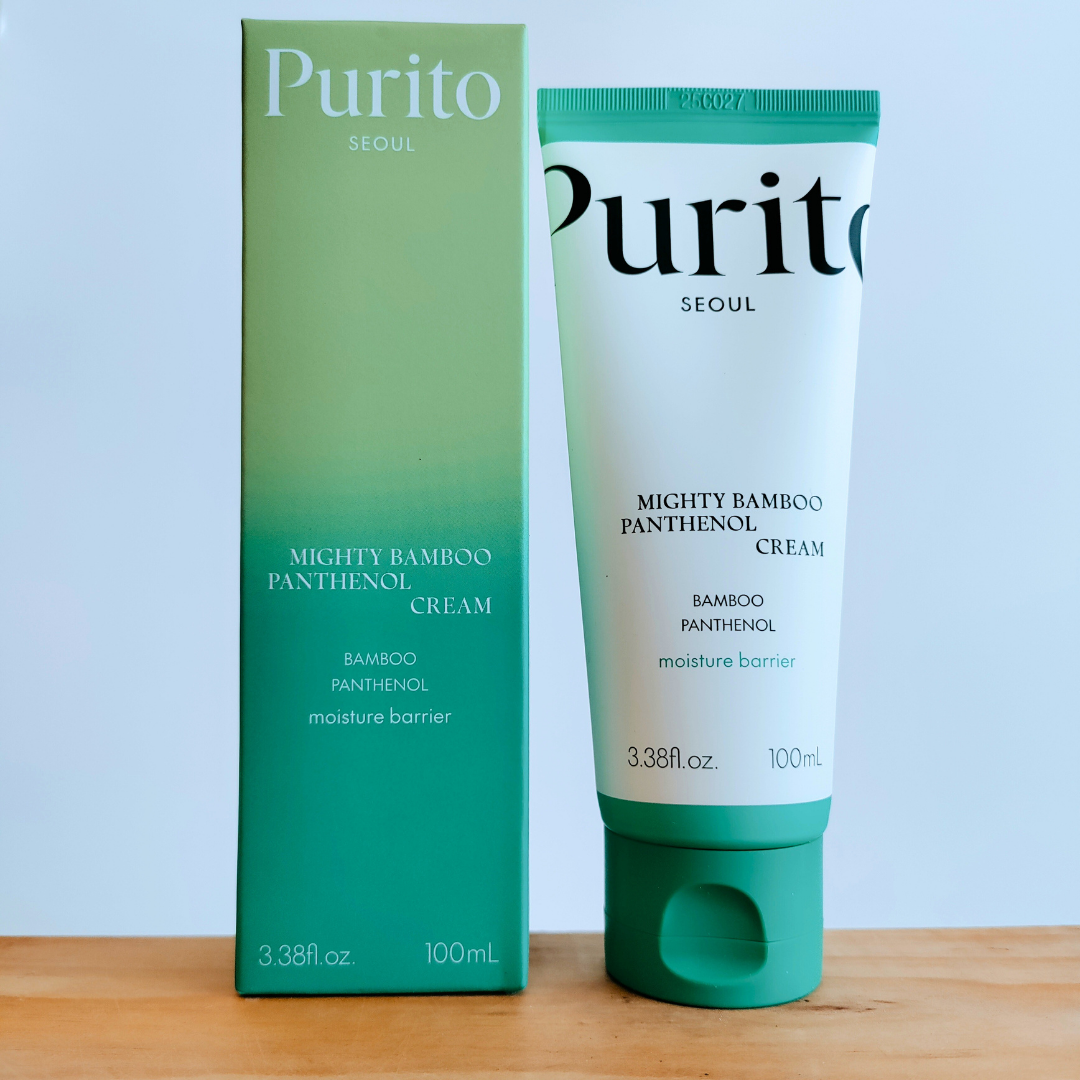Purito Mighty Bamboo Panthenol Cream with packaging on a wooden surface