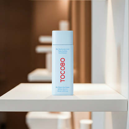 Tocobo Bio Watery Sun Cream SPF 50+ PA++++ 50ml on a shelf. 